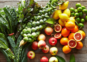 a group of fruits and vegetables on a wood surface Healthy Weight Loss Diets Moseley